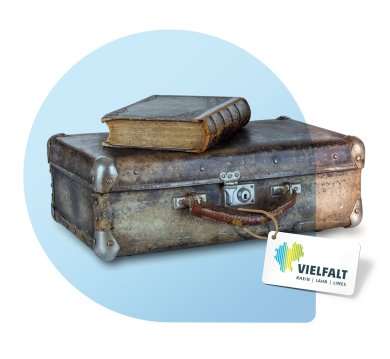 Old book on a suitcase Old book on a suitcase